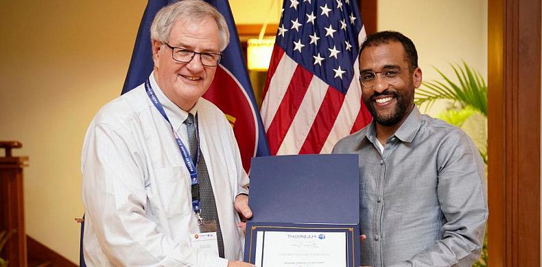 Bruce Svare '71 with U.S. Mission to ASEAN Ambassador Johannes Abraham at the ambassador's residence in Jakarta, Indonesia.